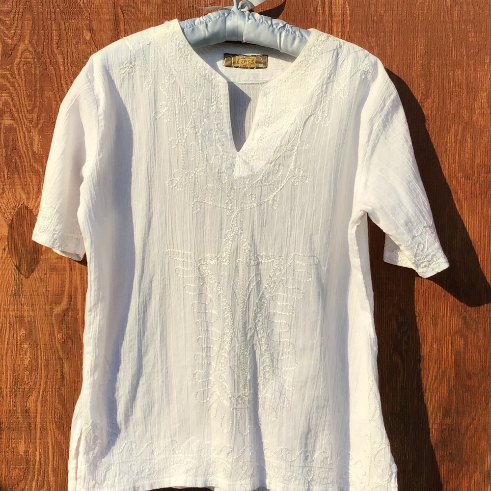 Light weight cotton embroidered blouse.
